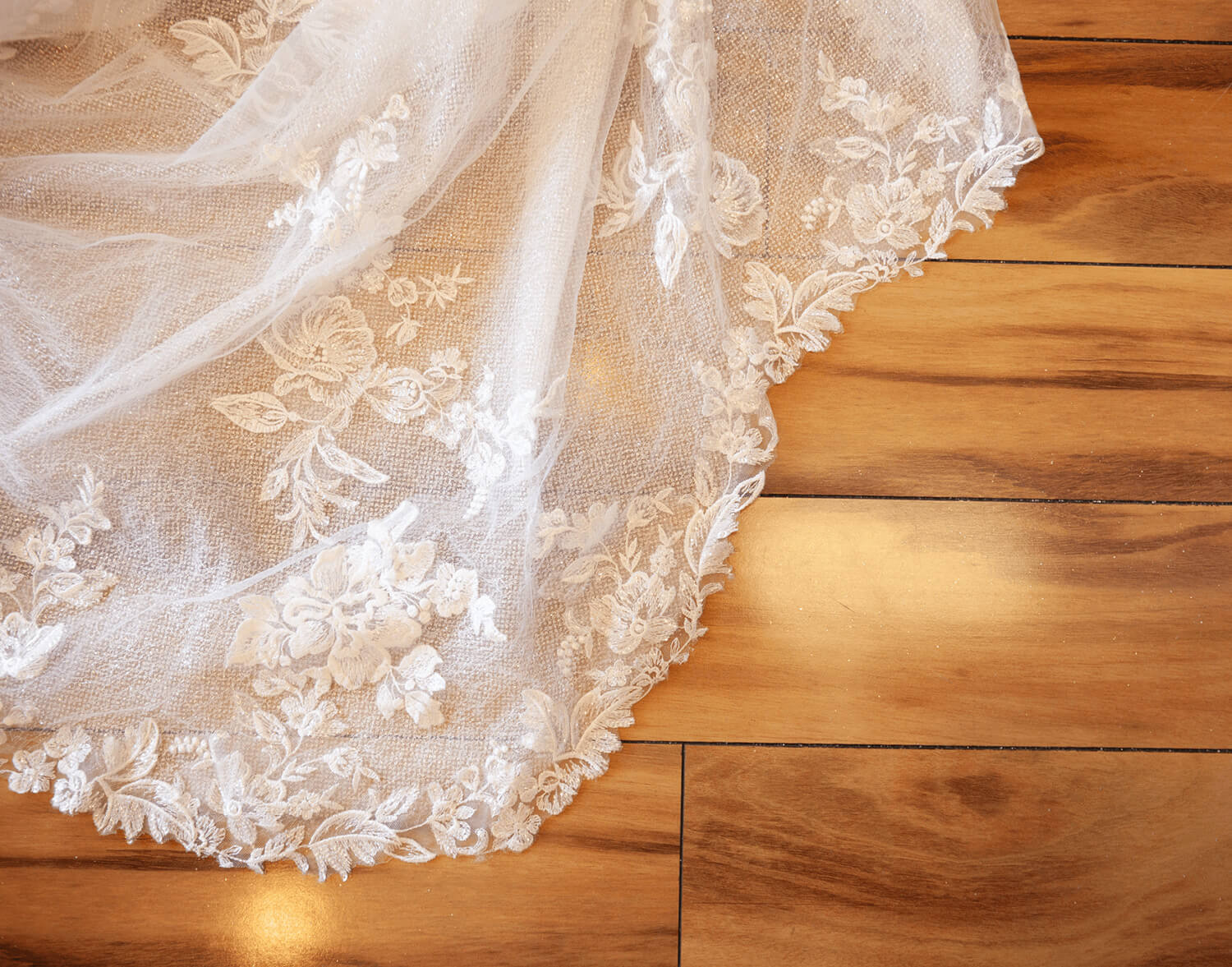 Bridal Dress on Wooden Floor. Mobile Image